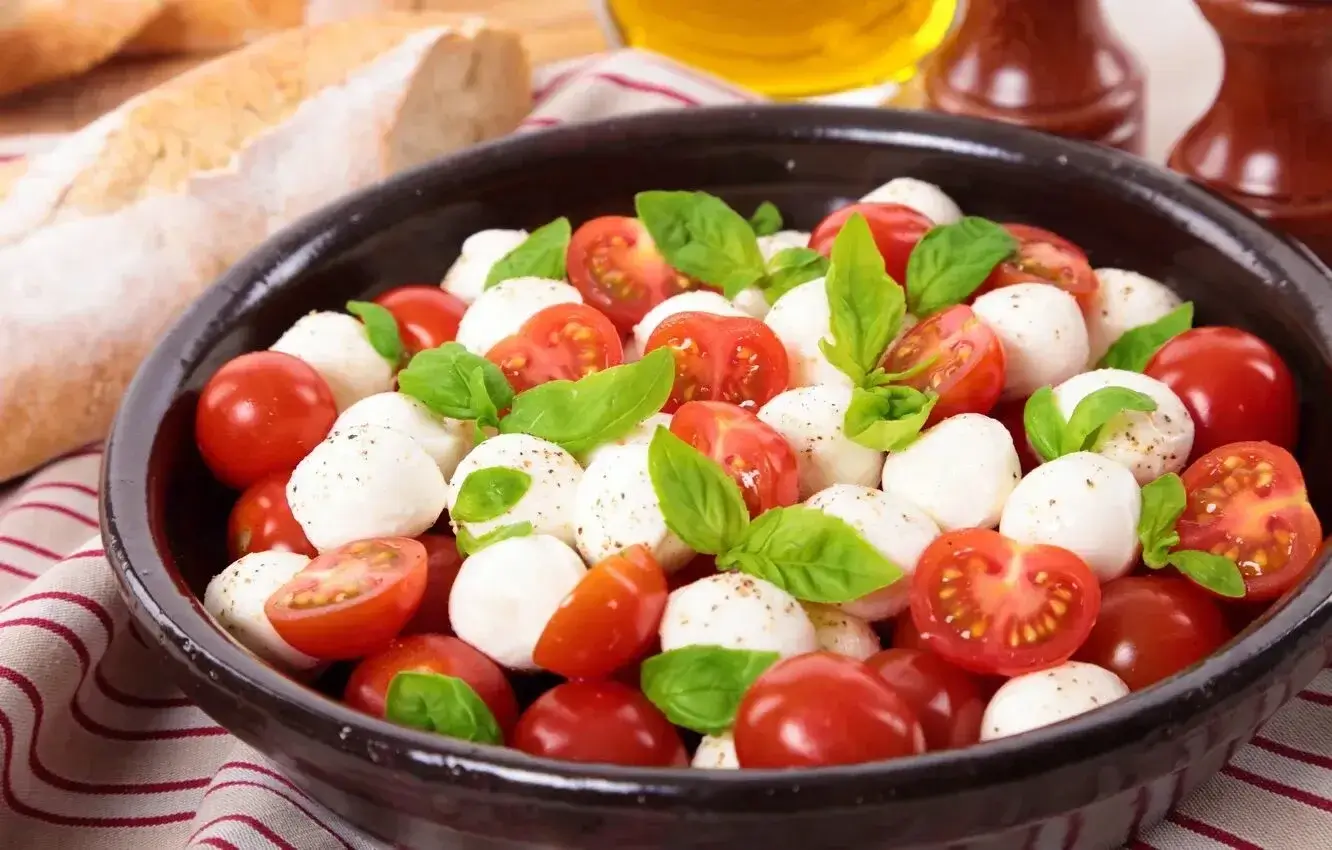 Fresh tomatoes, basil, and mozzarella cheese.